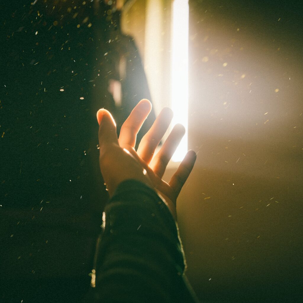 hand touching light