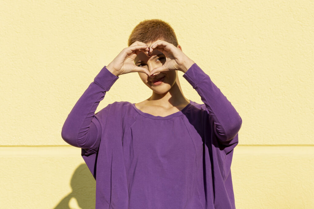 woman making a heart shape