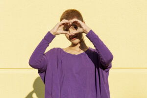 woman making a heart shape